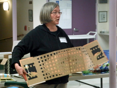Dorsey Hogg sharing her handmade accordion book