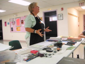 Penne Tompkins teaching calligraphy