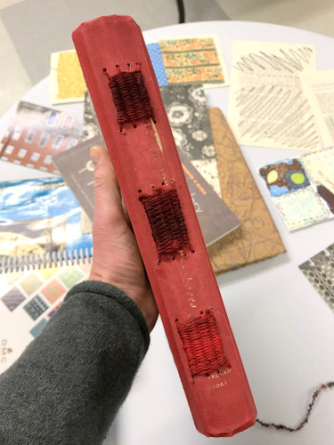 Handmade book with spine weaving