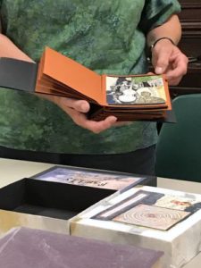 Person showing handmade book