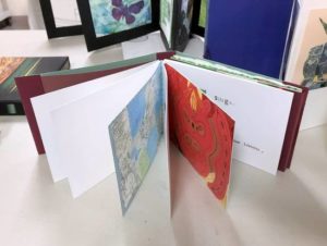 Handmade book of postcards