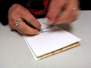 Sewing a handmade book